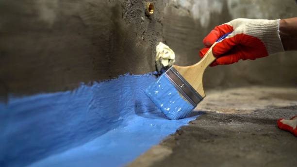 SJ Waterproofing Pros commercial waterproofing team near East Lansing, MI